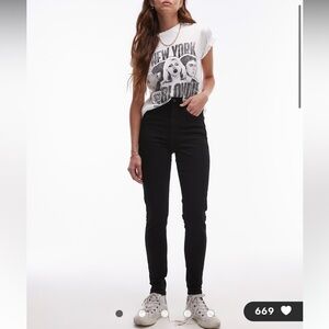 Top shop “Jamie” high rise skinny jeans. Black. Size 10 with distressed knees.